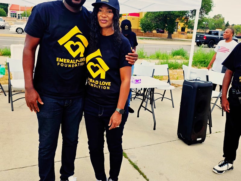 Two team members sharing a moment at the August outreach